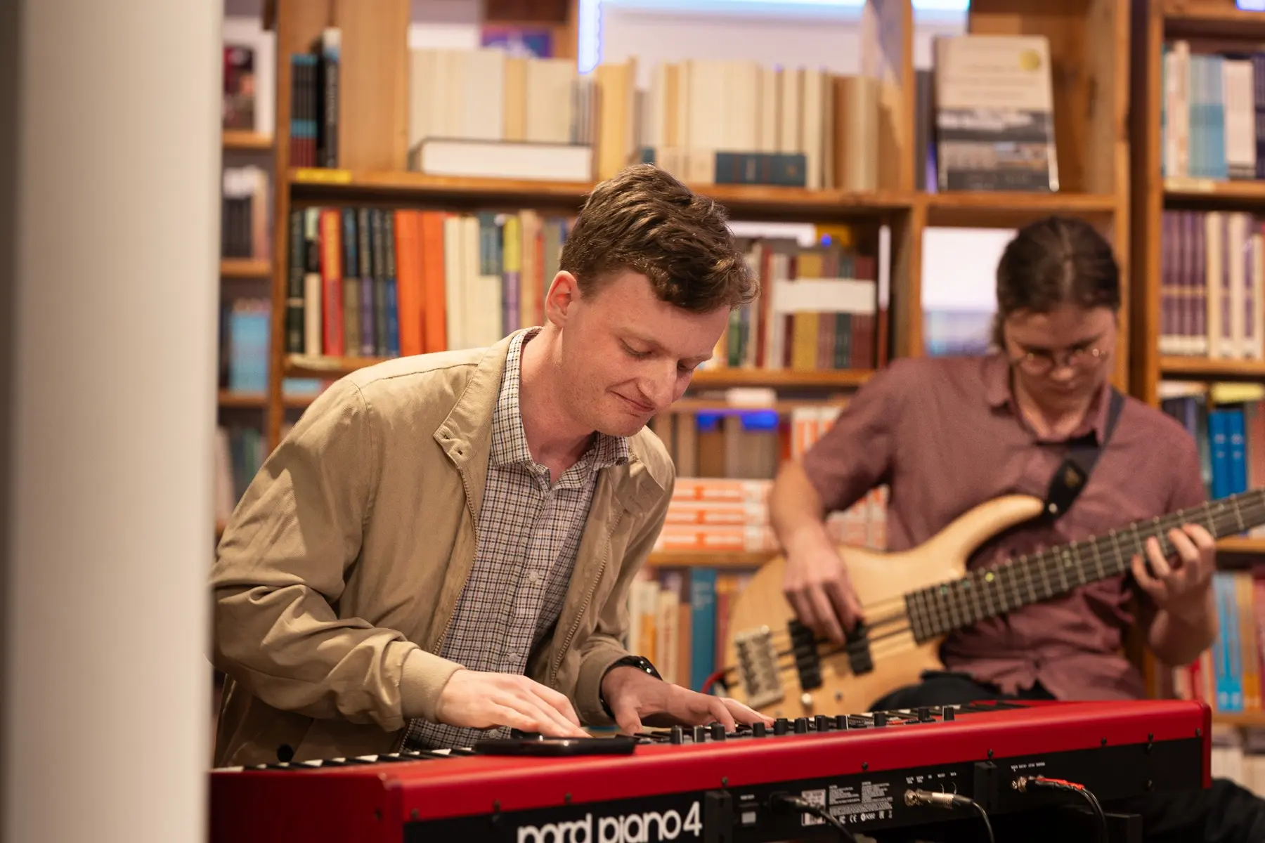 Reuben performing jazz piano alongside a bass player